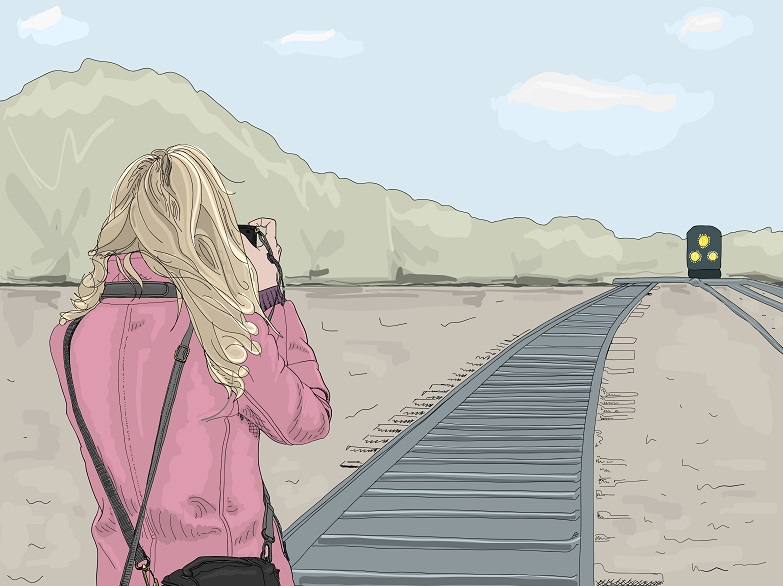 An illustration of a photographer taking a picture of a train.