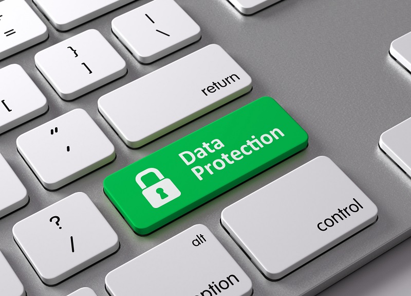 Un clavier avec une touche verte sur laquelle on peut lire 'Protection des données'.'Data Protection'.