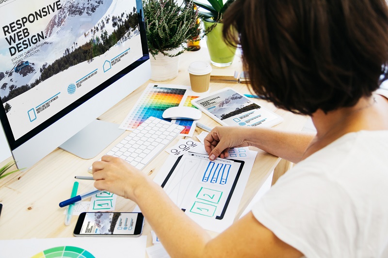 A woman working on a design project.