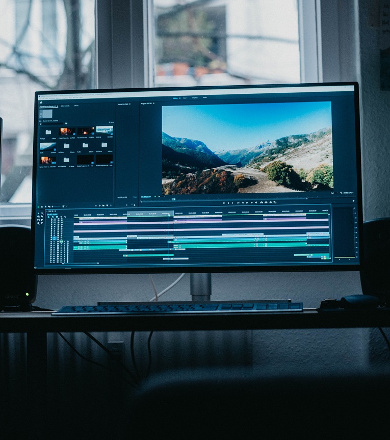 A laptop by the window.