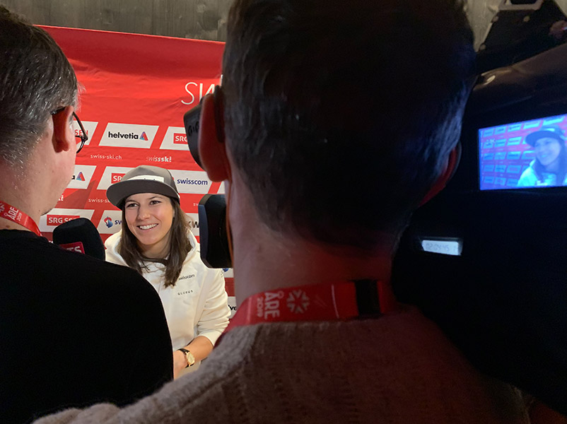 A ski athlete being interviewed.