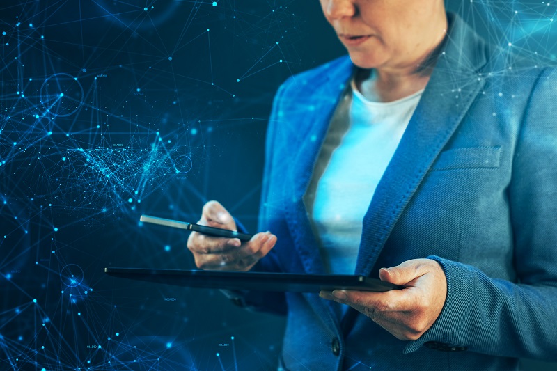 A businesswoman using a mobile device.