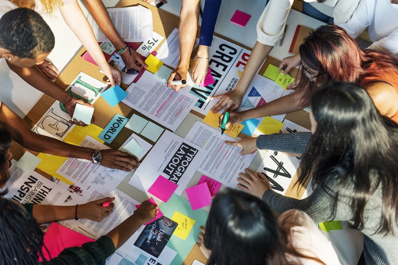 A group of workers collaborating.