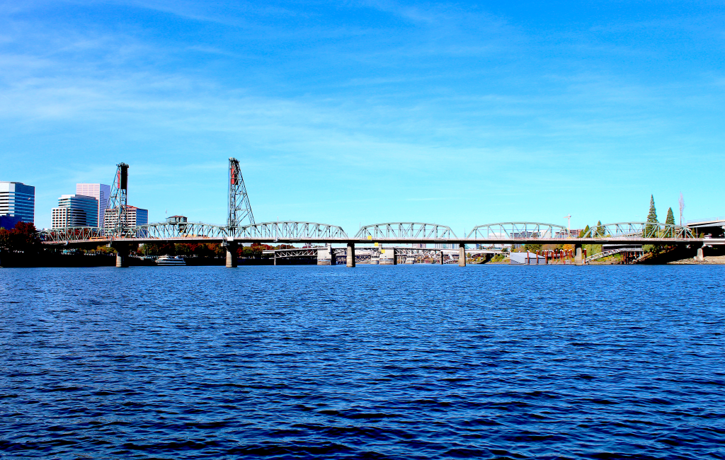 North-facing view of the Hawthorne Bridge crossing the Willamette River.