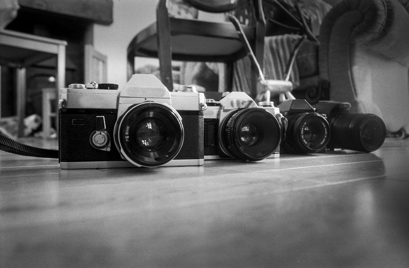 Vintage cameras in black and white.