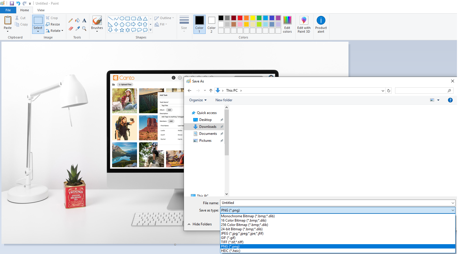 A screenshot of the Paint app converting a file.