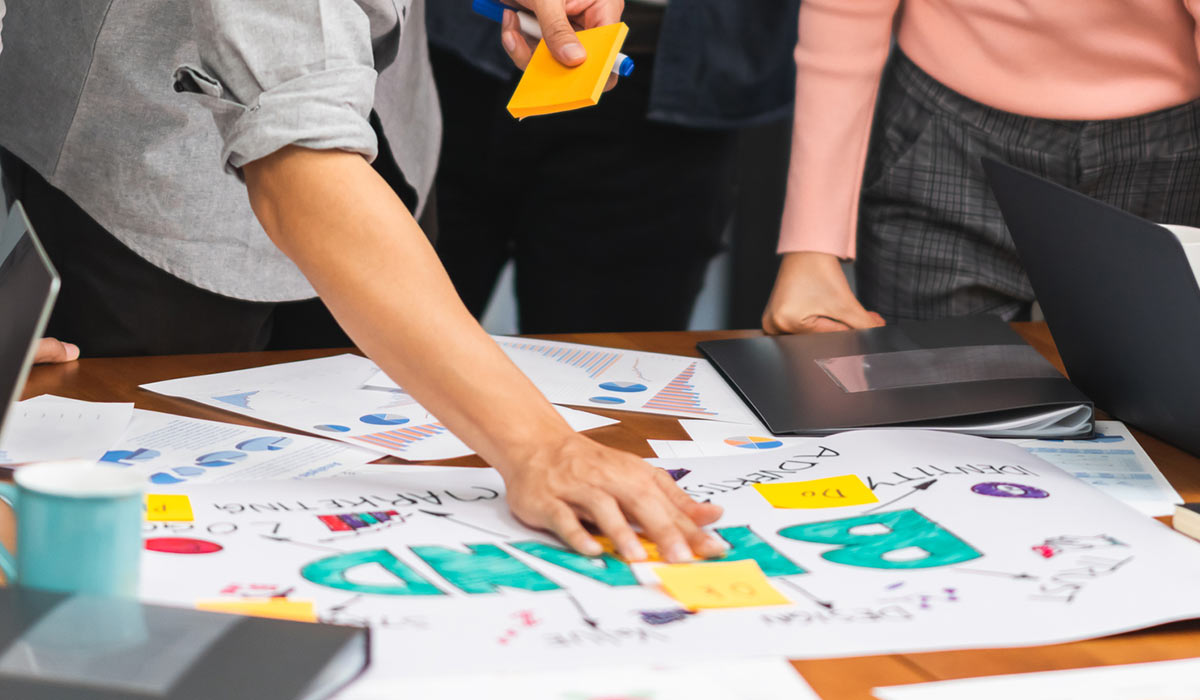 Workers grouping to accomplish branding tasks.