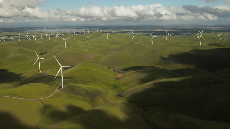 A group of windmills on hills.