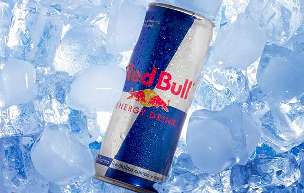 A can of Red Bull in ice.