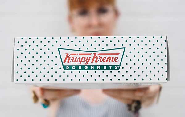 Krispy Kreme donuts in a box.