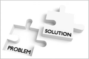 Eine Abbildung eines Puzzles, bei der die noch zu schließende Lücke mit dem Wort 'Problem', und das perfekt passende Puzzleteil mit dem Wort 'Lösung' bezeichnet ist.