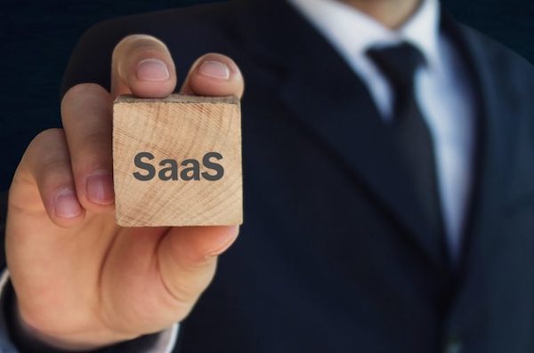 SaaS logo on a wooden cube