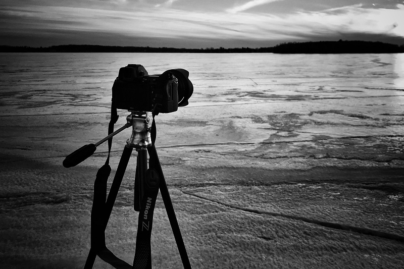 A camera on a beach.