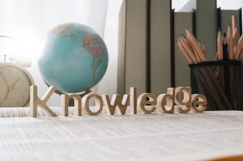 The word 'knowledge' on a book.