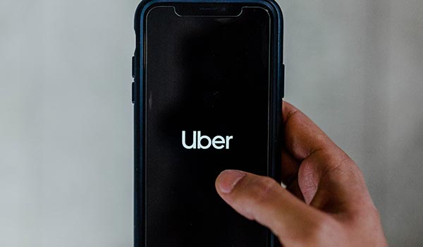 A smartphone with Uber showing.