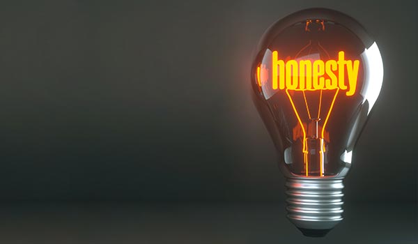 A lightbulb with the word 'honesty' inside.