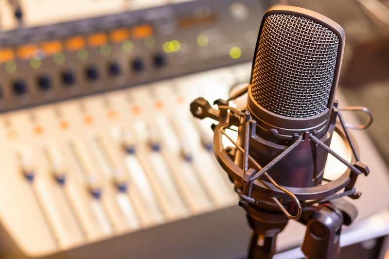 A microphone near a mixer.