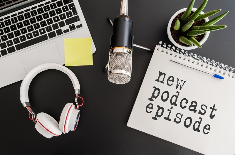 A desk with podcast gear on it.