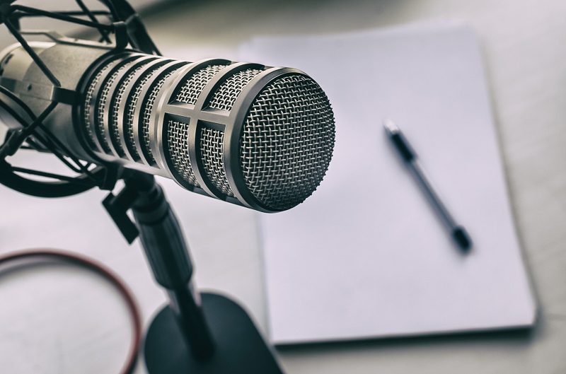 A microphone near a notebook.