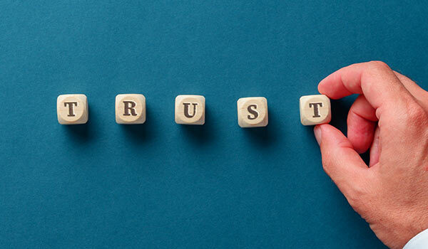 Building blocks that spell, 'trust'.