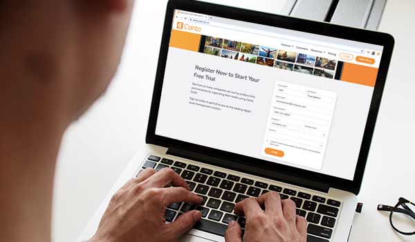 Canto free trial registration form on a laptop.