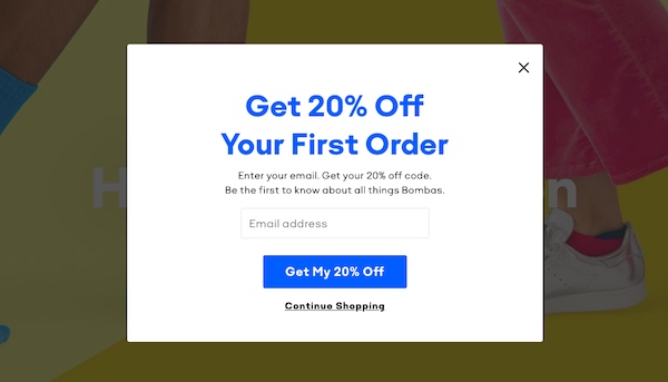 Email sign-up form offering 20% off first order.