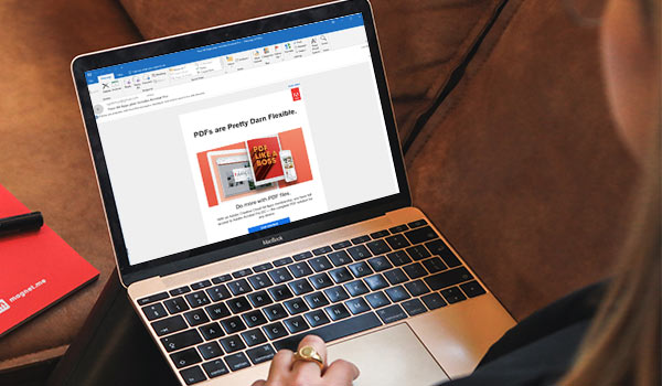 A lead-nurturing email from Adobe on a laptop screen.